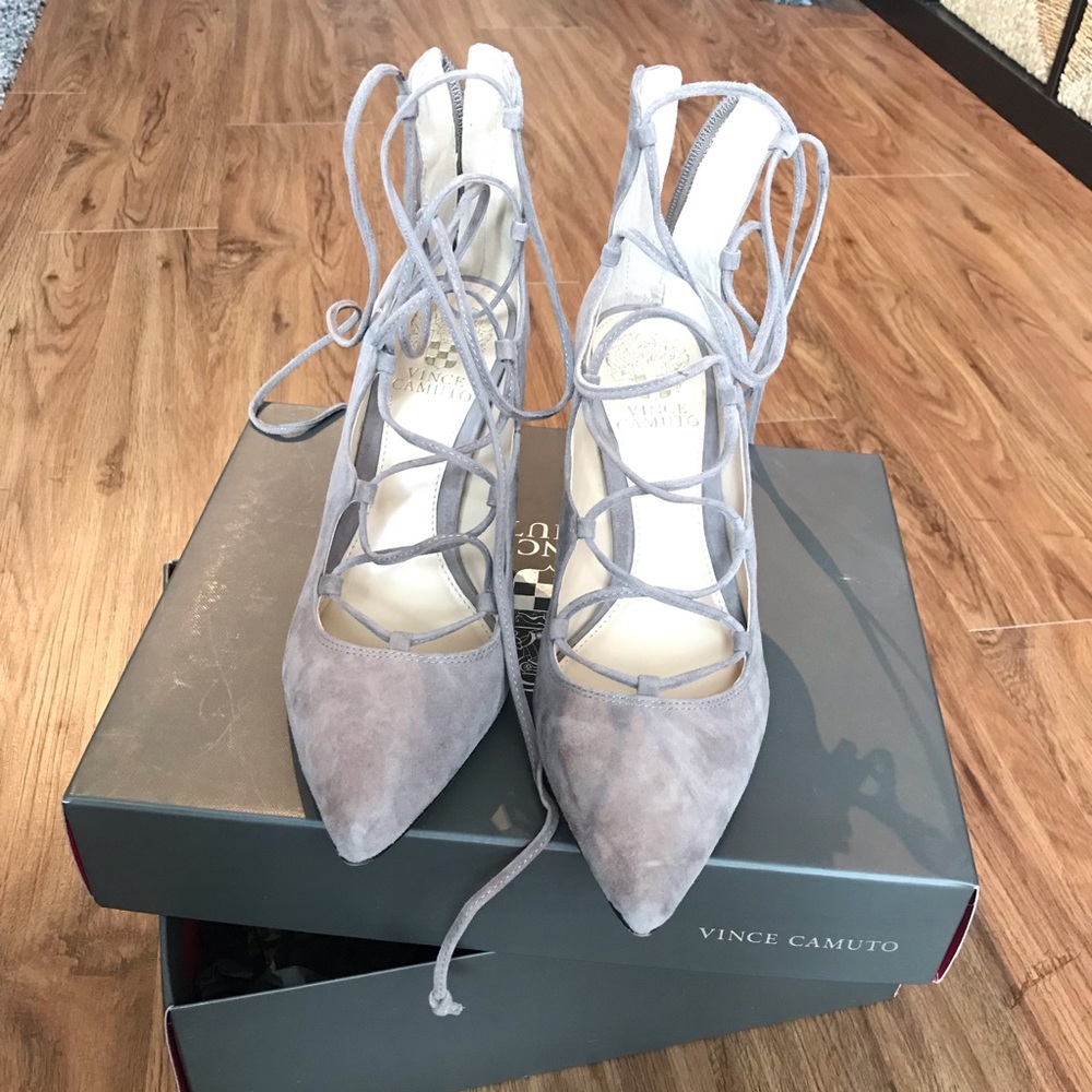 Vince Camuto, lace up, close toed, suede pumps.